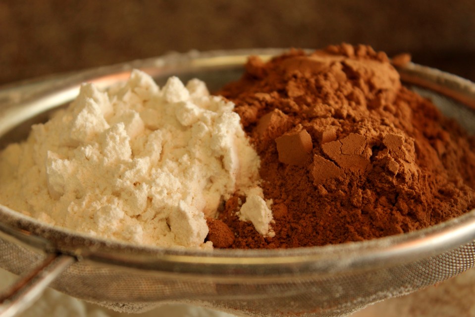 sifting flour and cocoa powder for chocolate beetroot cake